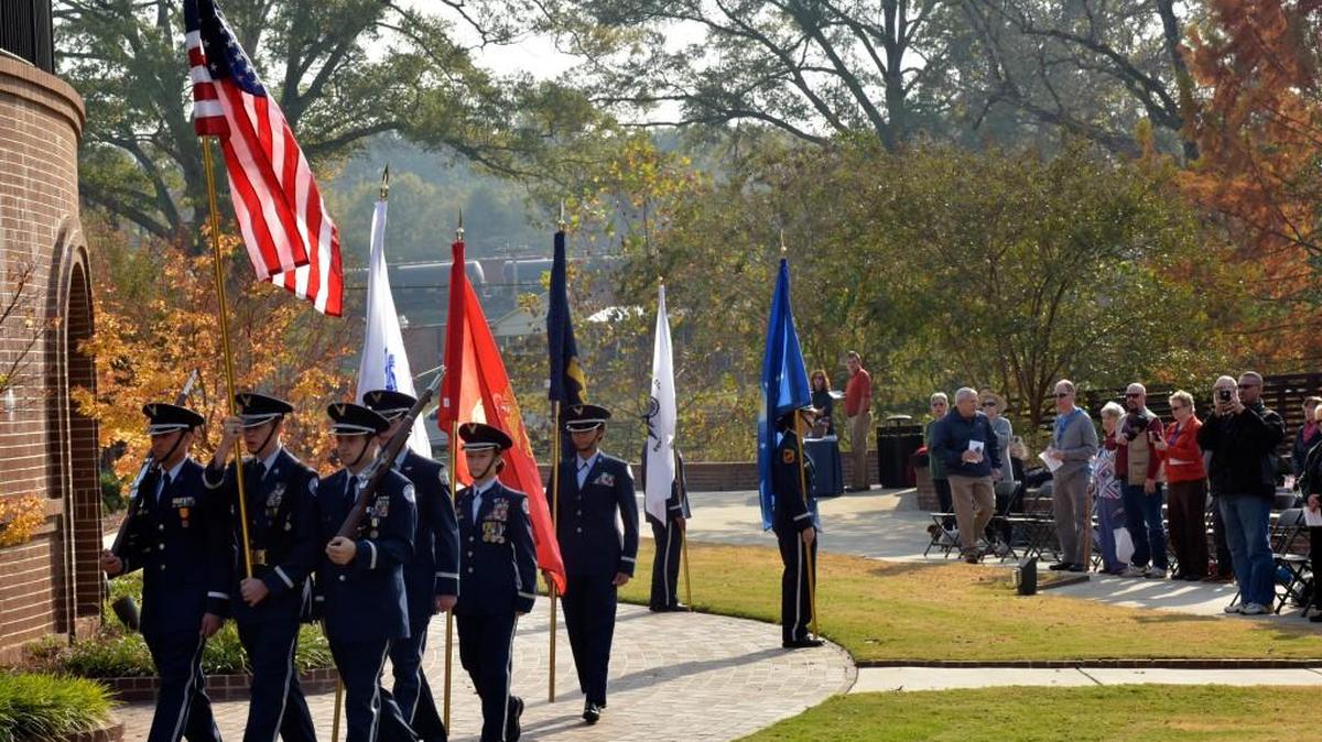 The Rock Hill High School Air Force Jr. ROTC participates in a tribute to veterans at Glencairn Garden. A veterans committee and the Rock Hill Parks, Recreation and Tourism coordinated Friday’s event.