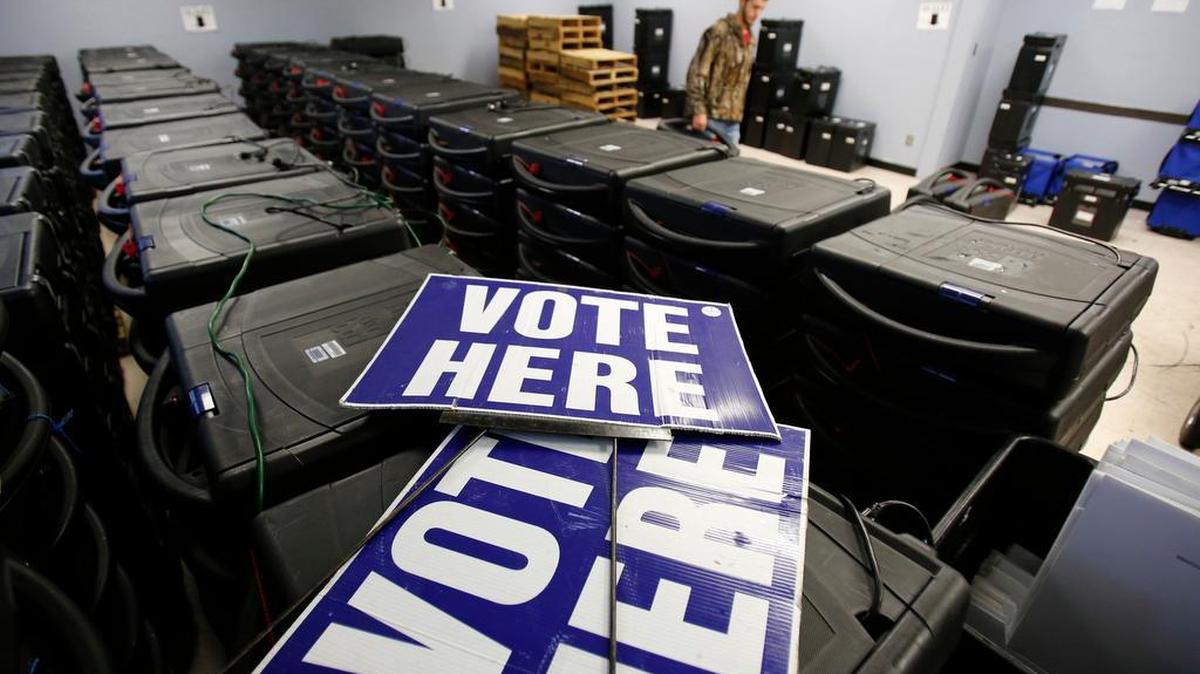 Voting machines at the York County elections office Monday are stacked and ready for delivery to polling places.