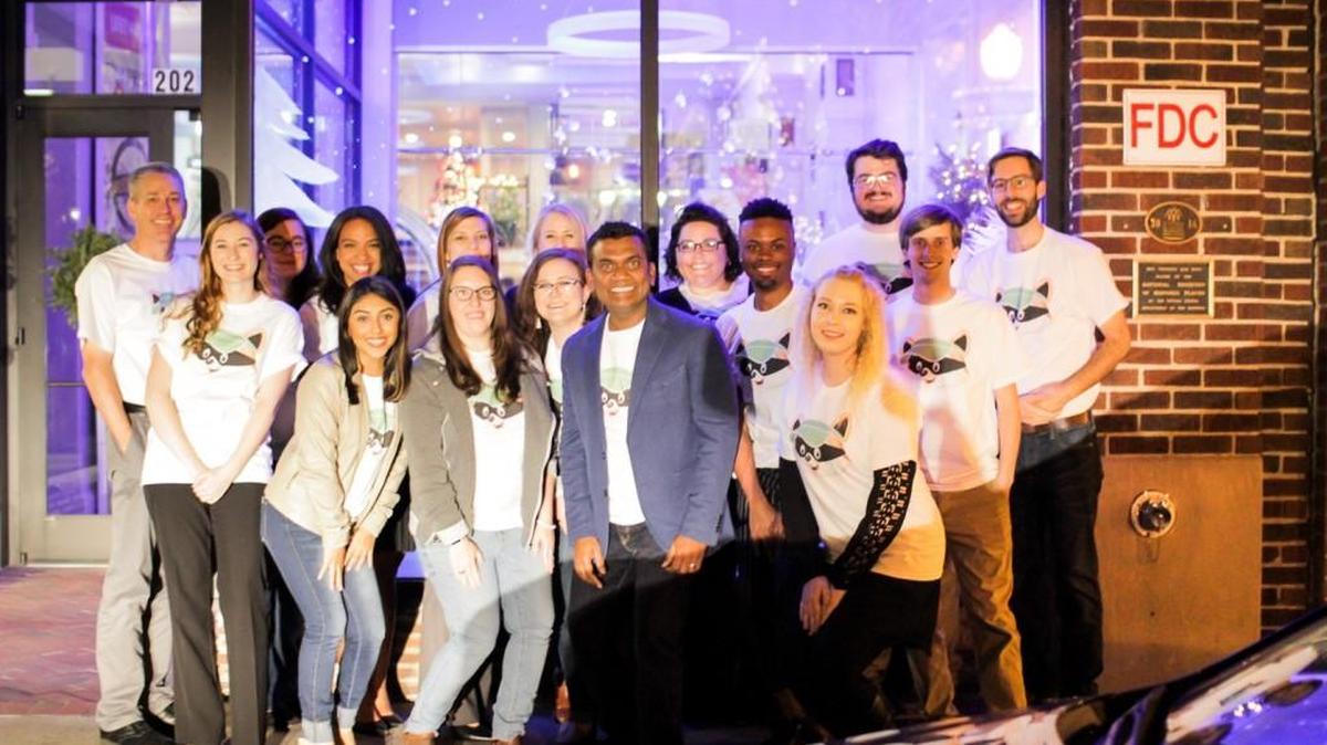 Agie Sundaram (center), co-founder and CEO of Rock Hill-based software developer Span Enterprises, poses with his team during a launch party of a new tax filing solution for small businesses and nonprofit organizations called TaxBandits.
