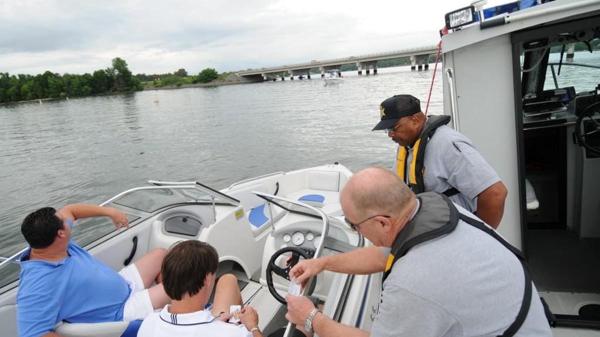 In this file photo, York County Sheriff’s Department officers stop two boaters to perform a routine boat safety check on Lake Wylie.