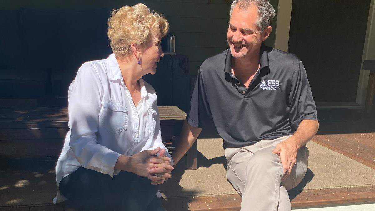 Sue Bockelman, left, and Kurt Kottcamp are neighbors and close friend. Kottcamp organized an Alzheimer’s Walk to remember Bockelman’s husband Paul, who died from Alzheimer’s.