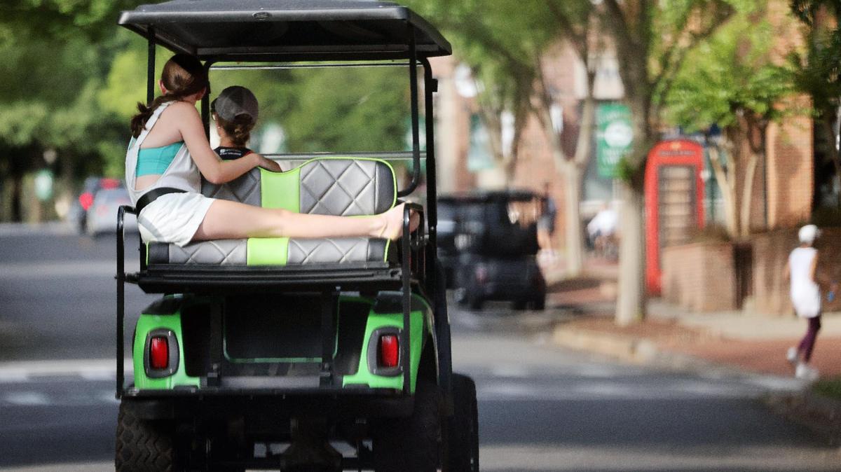 Residents of Baxter Village ride through a neighborhood Monday, June 9, 2025 in Fort Mill.