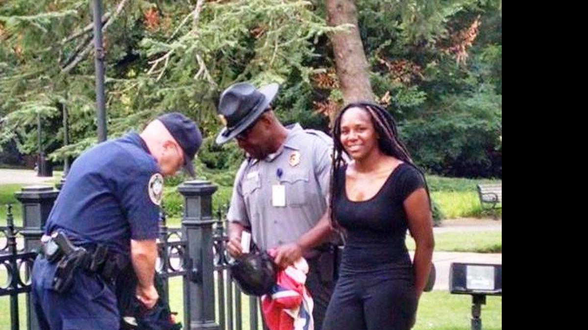 
A woman who took the Confederate flag down Saturday morning from the South Carolina State House grounds was quickly arrested by Bureau of Protective Services officers.
