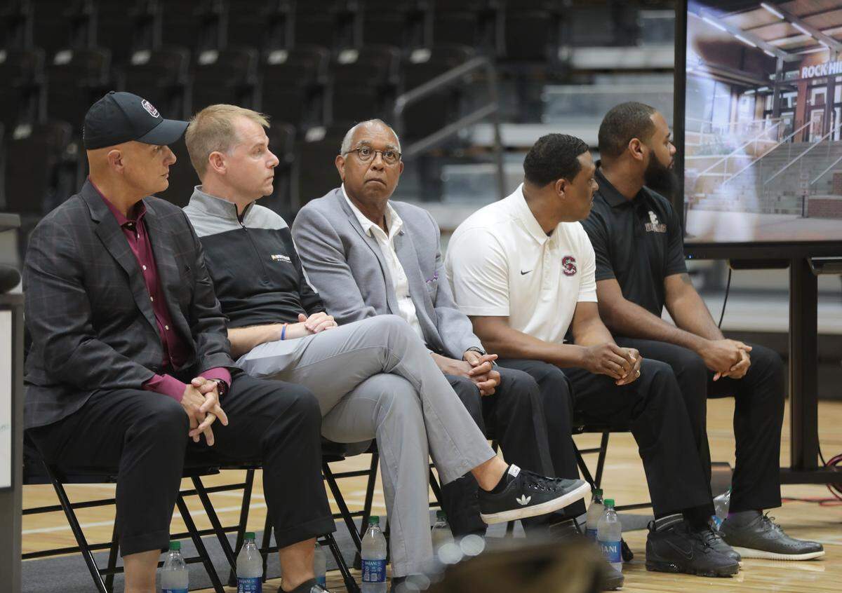 From left, University of South Carolina basketball coach Frank Martin, Winthrop coach Mark Prosser, High Point coach Tubby Smith, South Carolina State coach Tony Madlock and Clinton College athletic director Dee Frazier listen at a press conference announcing the No Room For Racism Basketball Classic at the Rock Hill Sports and Event Center.