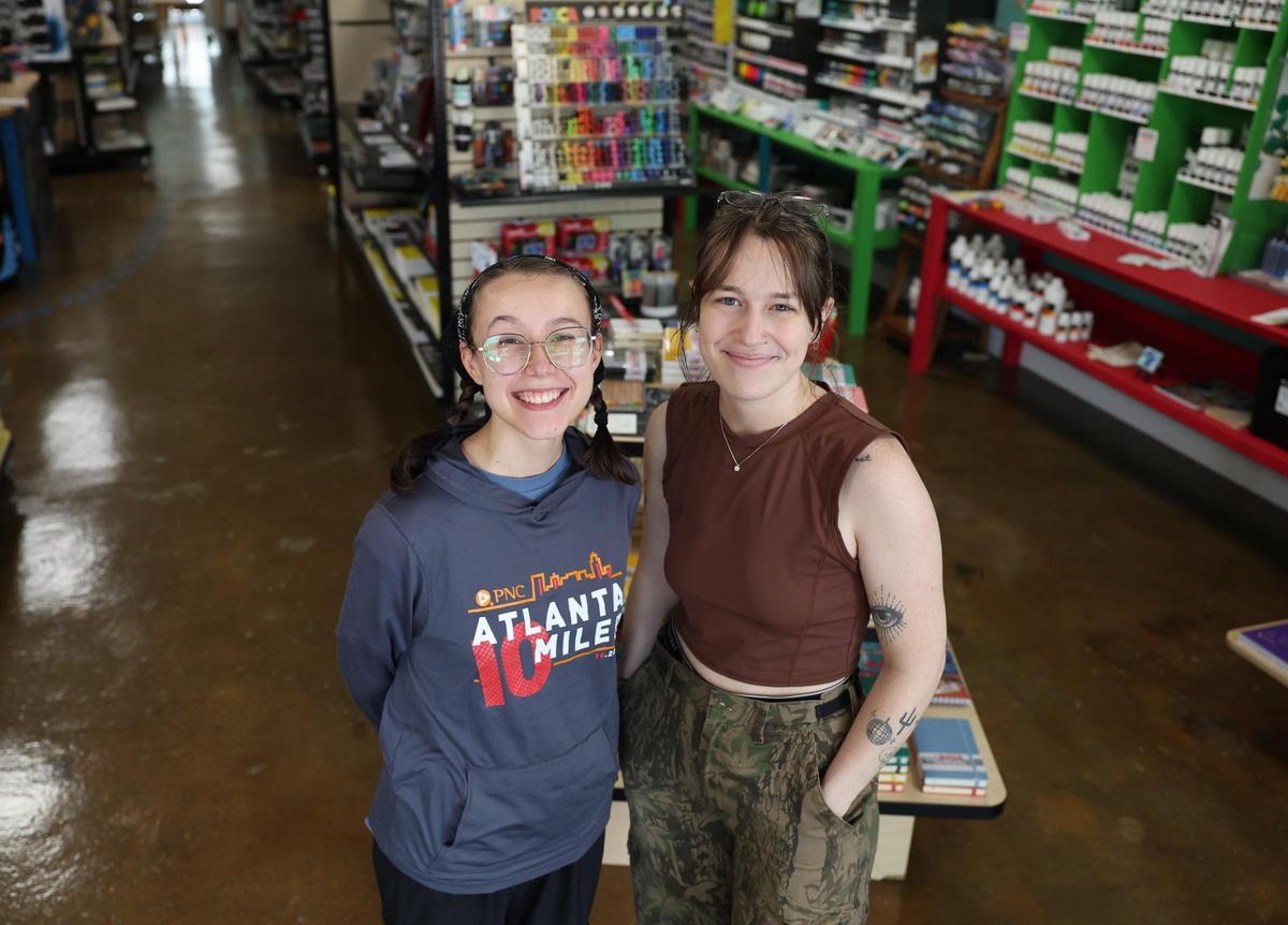 Emily Burnham, left, and Riley Funke are employees of Blue Goose Art Supplies in Rock Hill.