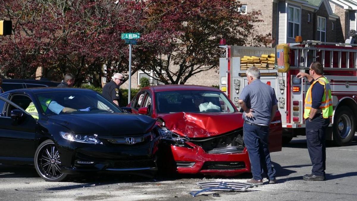 Two cars collided head-on in the intersection of West Main and Wilson streets Tuesday morning. Traffic was closed while the disabled vehicles were moved.