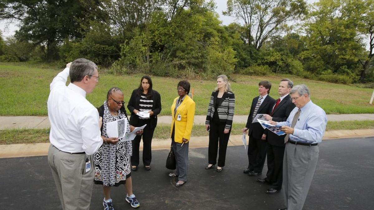 In this 2015 file photo, the Rock Hill City Council toured the Hagins-Fewell neighborhood to inspect some developments there. City Manager David Vehaun, left, and city employee Jennifer Wilford, third from left, joined council members, from left, Sandra Oborokumo, Ann Williamson, Kathy Pender, John Black, Jim Reno and Mayor Doug Echols.