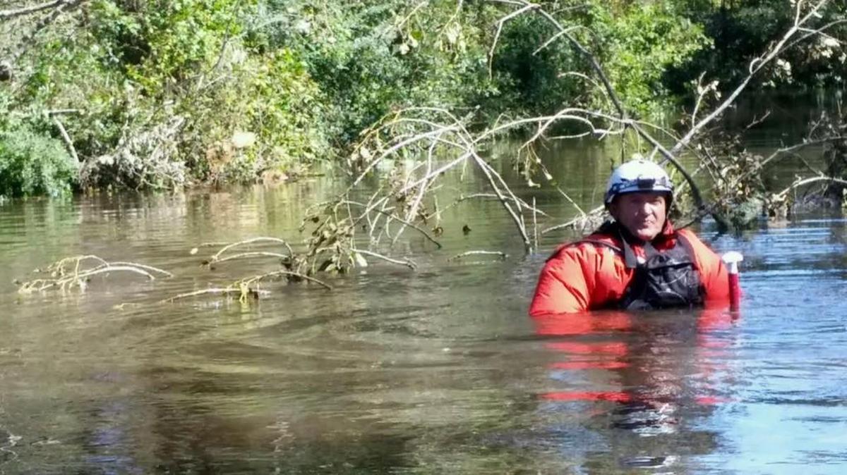 Capt. Charlie Mitchell of the Rock Hill Fire Department was up to his shoulders in water as they assisted people from flooded homes in Marion County on Tuesday. Several local agencies have sent crews to assist other parts of the state hit hardest by Hurricane Matthew.