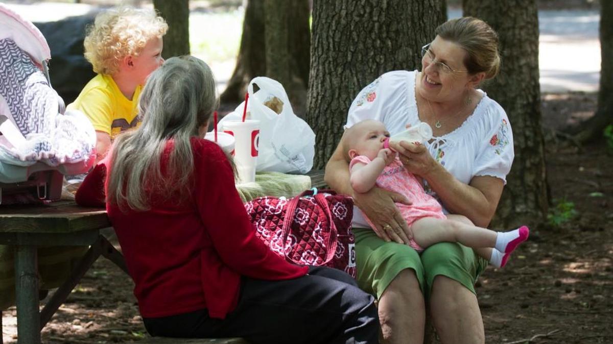 Judy Teal, right, has a picnic with her mother, Betty Floyd, and grandchildren Bentlee Watts, 2, left, and Neely Watts Tuesday at Cherry Park in Rock Hill. Teal said she began smoking as a teenager because she didn’t know the dangers, but quit 36 years ago.