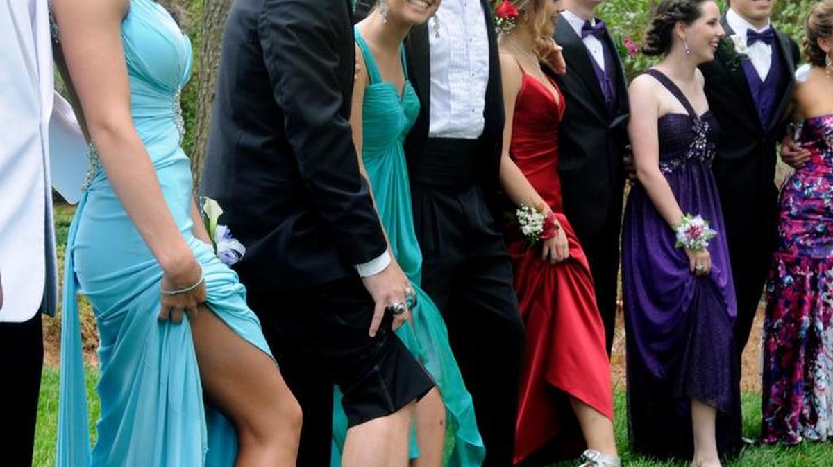Prom-goers pose for photos at Glencairn Garden in Rock Hill before attending their high school prom.