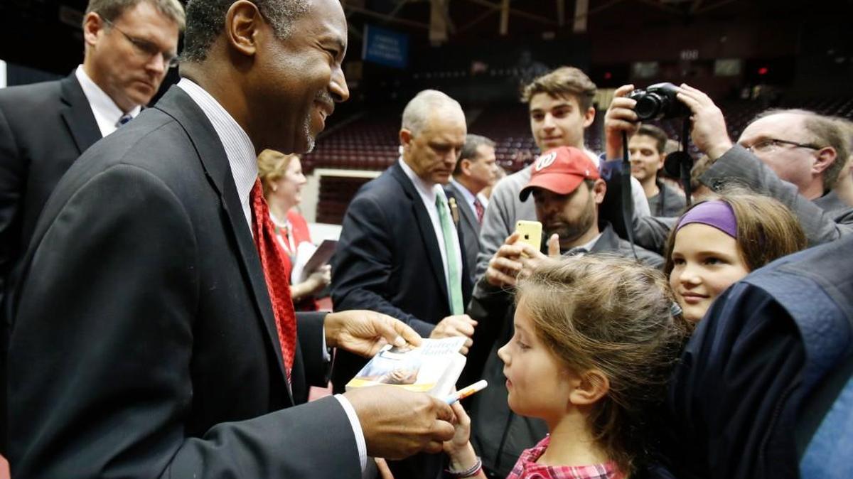GOP presidential candidate Ben Carson speaks at the Winthrop Coliseum in Rock Hill Wednesday. Ben Carson greets the crowd at the end of his appearance.