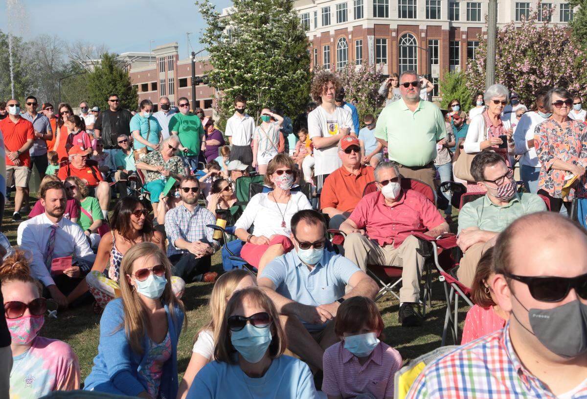Thousands gather Sunday at Fountain Park in Rock Hill to remember Robert and Barbara Lesslie, their grandchildren Adah and Noah Lesslie, all of Rock Hill; Robert Shook and James Lewis of North Carolina.