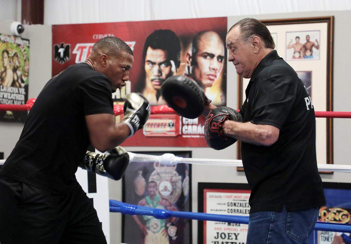 Rock Hill boxer Craig Parker, left, trains with Jesse Reid.