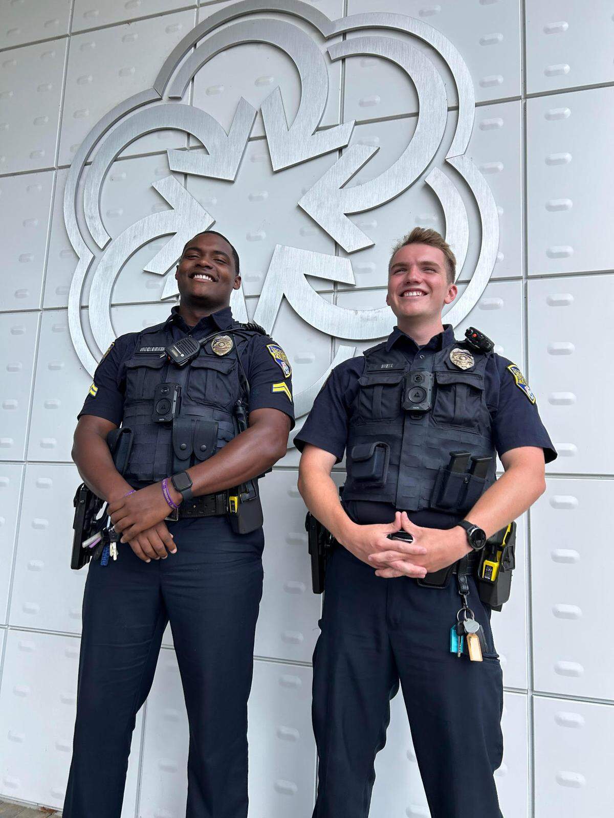 Rock Hill police officers Justin McClurkin, left, and Jordan Well, right, pose for a photo. The two worked together to prevent a man from jumping off a bridge over Interstate 77 on June 30.