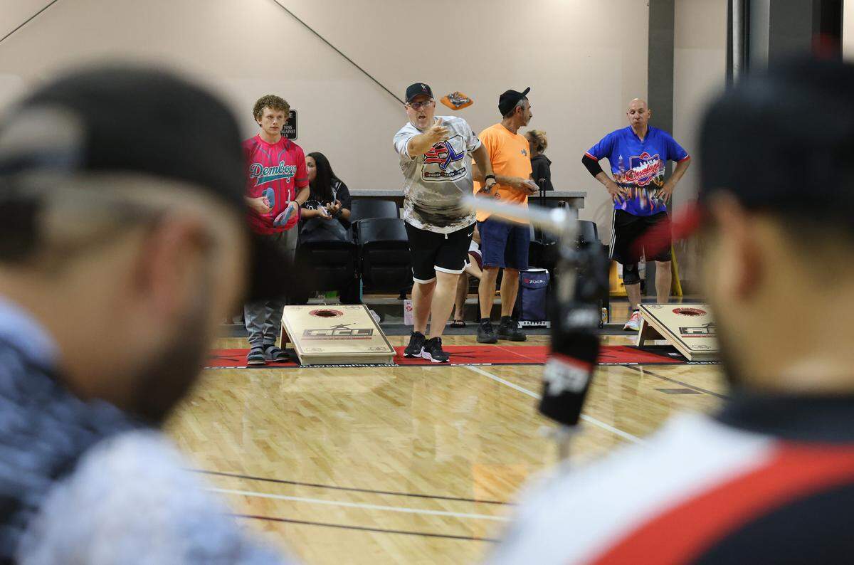 Cornhole players throw their bags Friday at the American Cornhole League World Championships in Rock Hill, S.C.