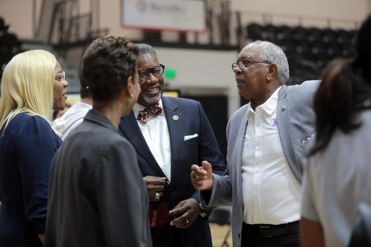 High Point University head basketball coach Tubby Smith, right, speaks with Clinton College president Lester Agyei, center, and attendees Thursday at a press conference for the No Room for Racism Classic at the Rock Hill Sports and Event Center.