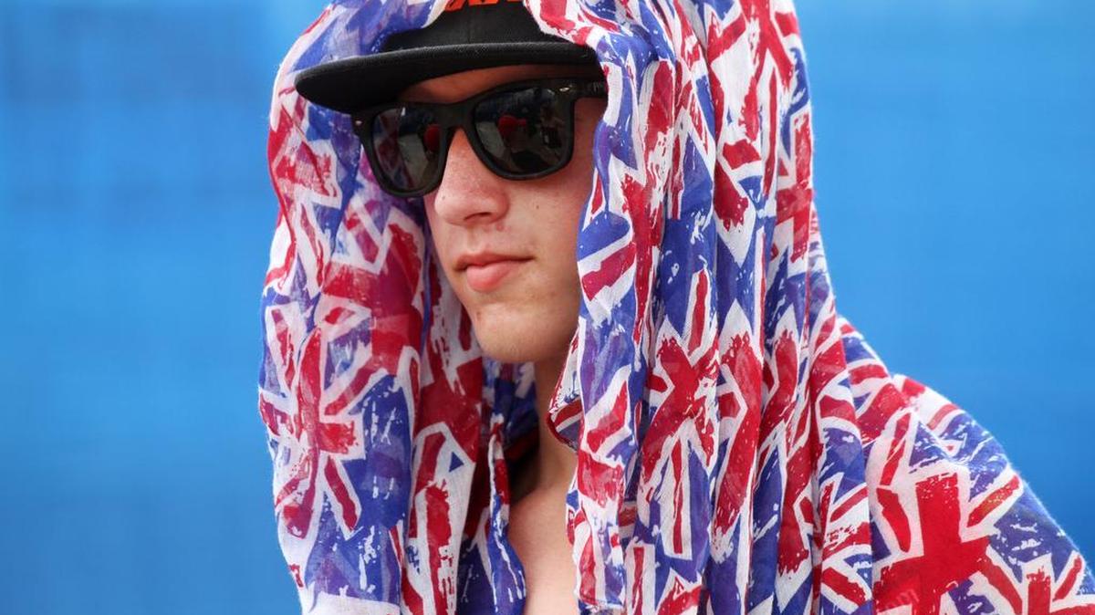 Kyle Hill, 13, of England, keeps cool under a British flag scarf Wednesday at the 2017 UCI BMX World Championships in Rock Hill.