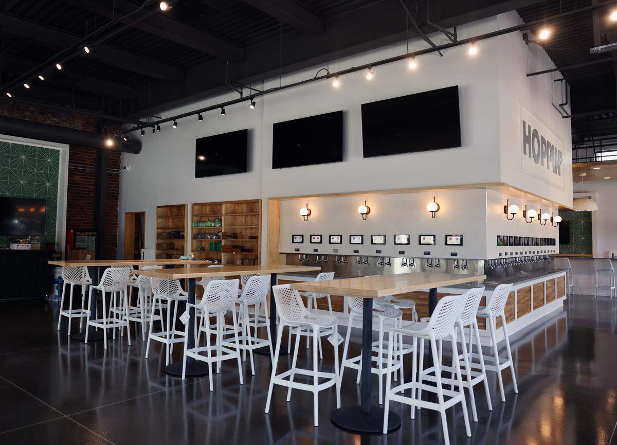 Hoppin’ Rock Hill is a self-pour taphouse with beer garden, located in an historic cotton warehouse in downtown Rock Hill.