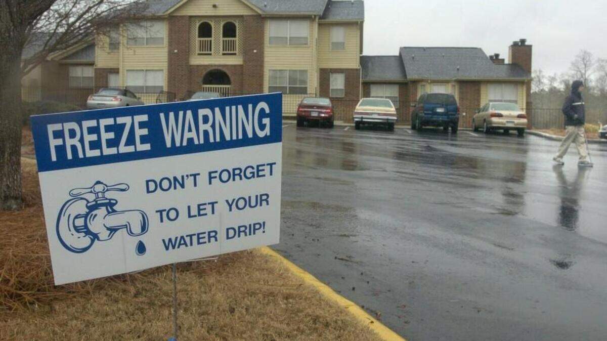 In this 2005 file photo, a sign reminds residents at a Columbia apartment complex to not let their pipes freeze.