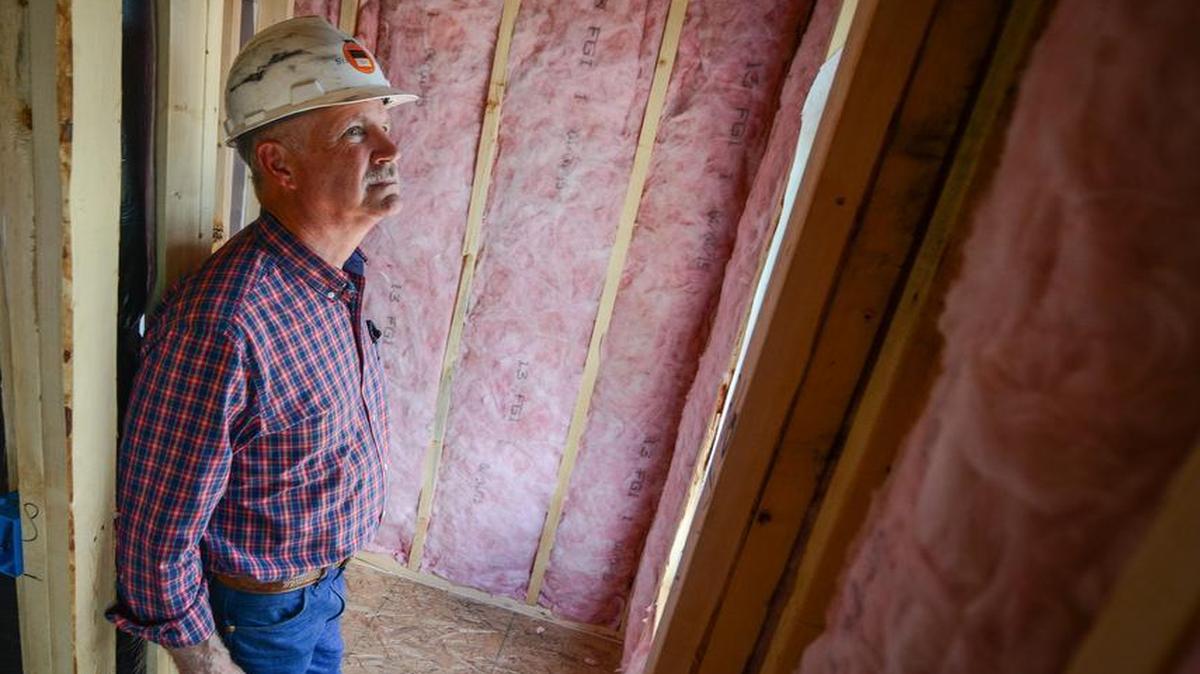 
York County building inspector Danny Scoggins inspects the insulation in a residential construction project in Lake Wylie. 

