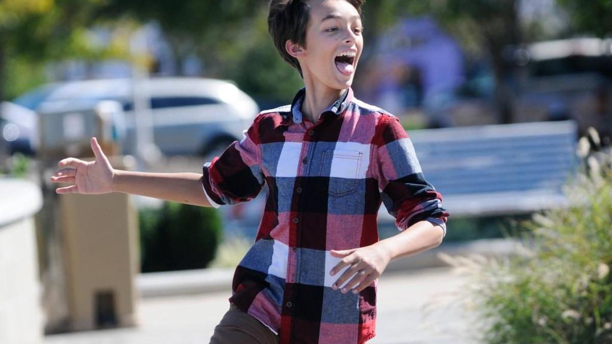 Gavin Guffey, 13, runs around Friday afternoon in Fountain Park in downtown Rock Hill.