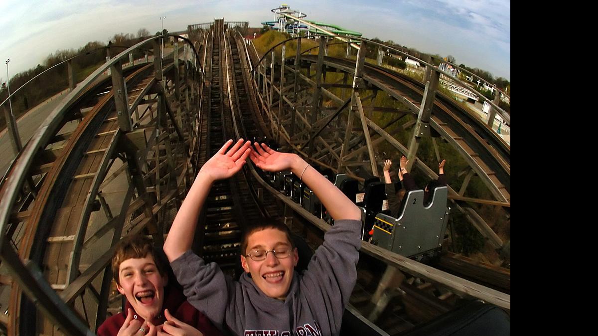 
Fort Mill twins Erik, left, and Travis Williams, both 14, ride Thunder Road as Carowinds celebrated the roller coaster's 30th birthday in March. 
