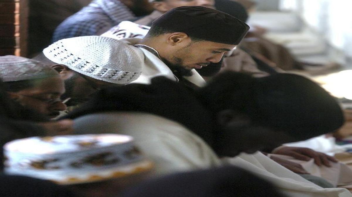 
Men praying in the shrine at Islamville in York. Two dozen Christian pastors in York County have joined together to publicly call on members of their faith to embrace Muslims as their brothers and sisters.
