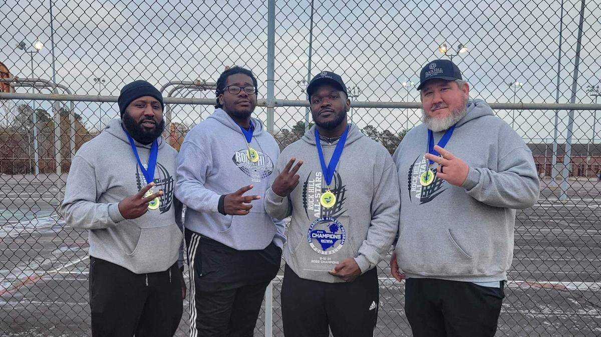 (From left to right) Coaches Stewart Good, Jay Brown, Lawrence “Snoop” Brown and Buster Howard led the 10U Rock Hill Allstars to their second straight state championship with a 6-0 victory over Florence Dec. 10. Ty Colvin (not pictured) led the 8U team to its second-consecutive state championship with a 12-0 win over Easley.