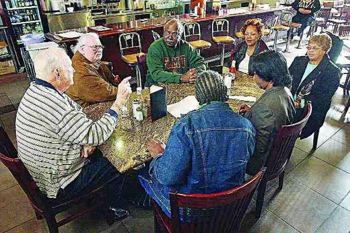 Clockwise from left, Elwin Wilson, Steve Coleman, David Williamson, Phyllis Hyatt, Elsie Springs, Patricia Sims and Willie McCleod talk about incidents during civil rights demonstrations in Rock Hill in the 1960s.