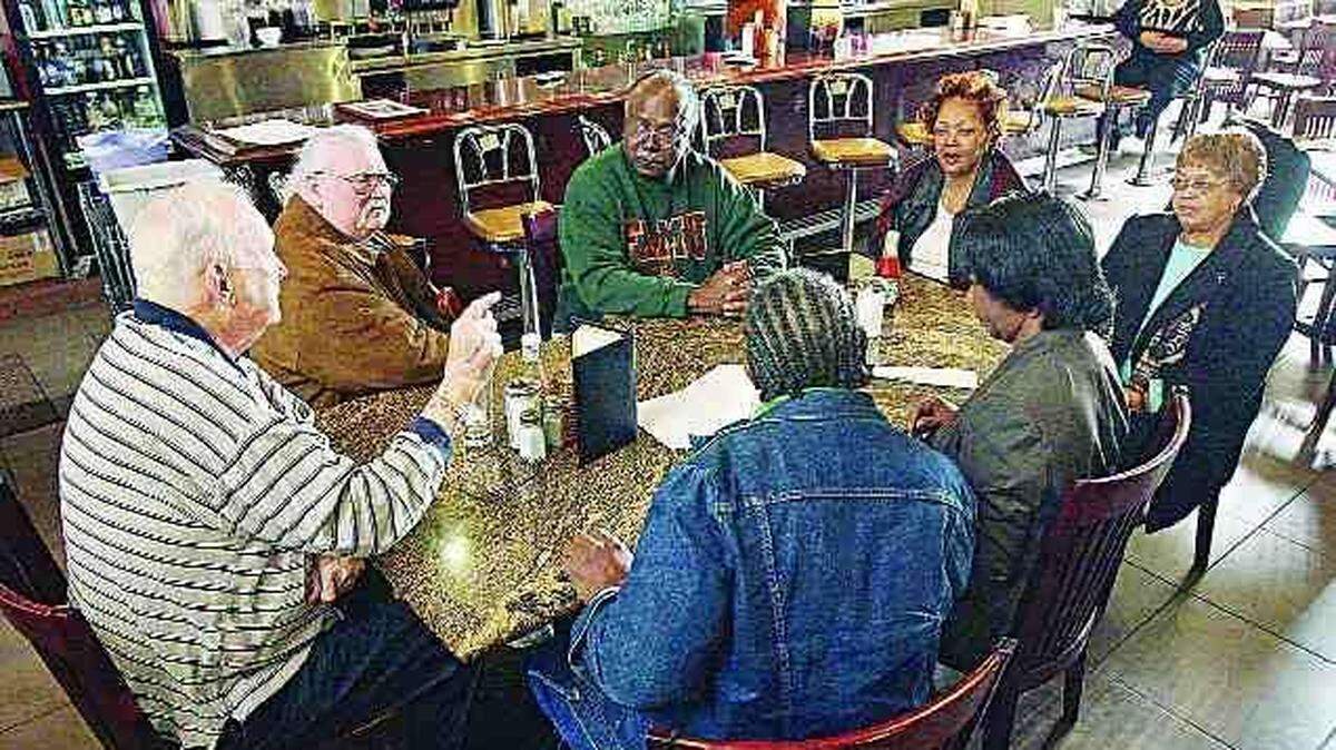 Clockwise from left, Elwin Wilson, Steve Coleman, David Williamson, Phyllis Hyatt, Elsie Springs, Patricia Sims and Willie McCleod talk about incidents during civil rights demonstrations in Rock Hill in the 1960s.