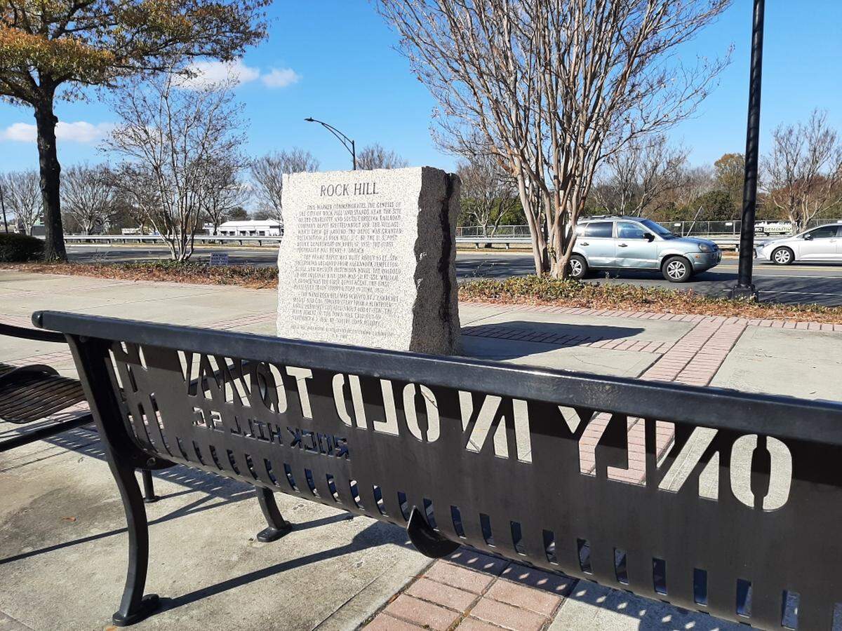 An Only in Old Town bench sits beside a marker where Rock Hill was founded, just beside Dave Lyle Boulevard near Main Street. The Storyline linear park will go through the area, with a new pedestrian bridge across Dave Lyle.