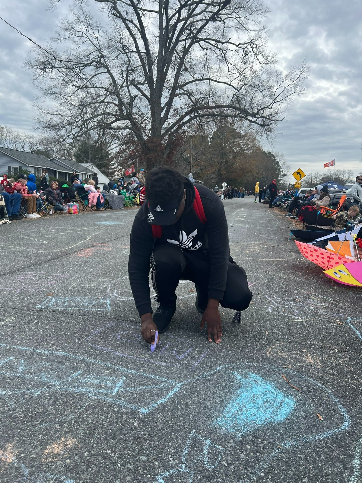 There was a contest among the group I was standing with. If a horse poops on a spot with your name, you get a prize. I had to take part in the action. (Spoiler alert: I did not win.)