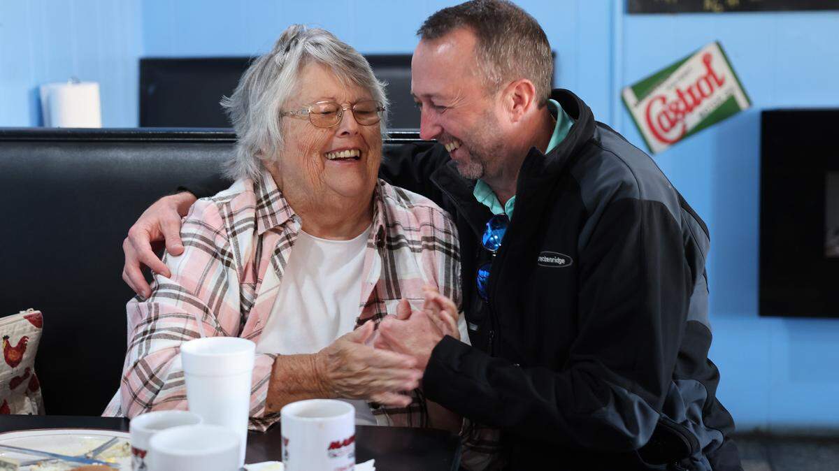 Newly elected Mayor of Clover, Bo Legg, hugs family friend Carol Jenkins on Monday at Victoria’s Diner.