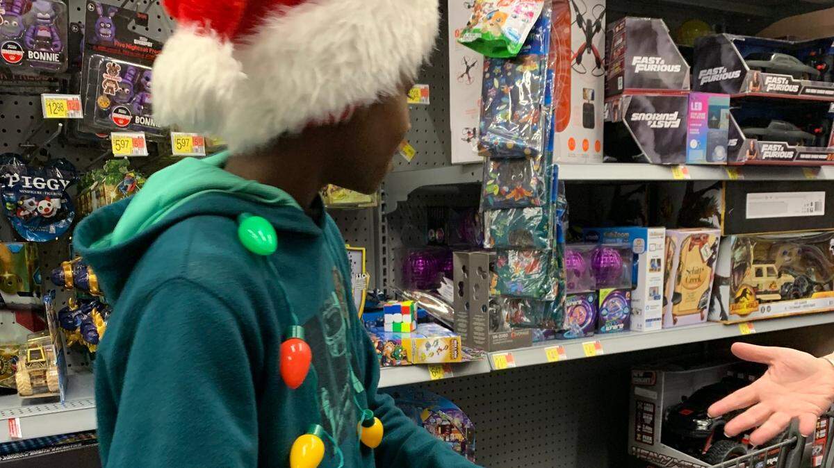 The $400 allocated to each kid comes from community donations. Capt. Roderick Stinson said donations came from everywhere, including police officers and district staff.