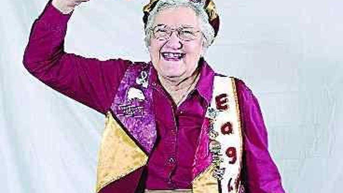 Zeta Sistare, 71, of Fort Mill poses in her Winthrop garb. Sistare made the vest and hat herself and has a collection of Winthrop memorabilia dating back decades. Sistare and her husband, Joe, whom she met while attending Winthrop from 1953-1955, have been Eagle Club members since 1979 and have sat in Section 123, Row L, Seats 13 and 14 in the Winthrop Coliseum since the team started playing there. She is disappointed that, due to illness, she will not be able to travel to Spokane for the Eagles’ first-round game. Sistare, who was a Winthrop administrative specialist for 23 years says, “The fans are a family.”