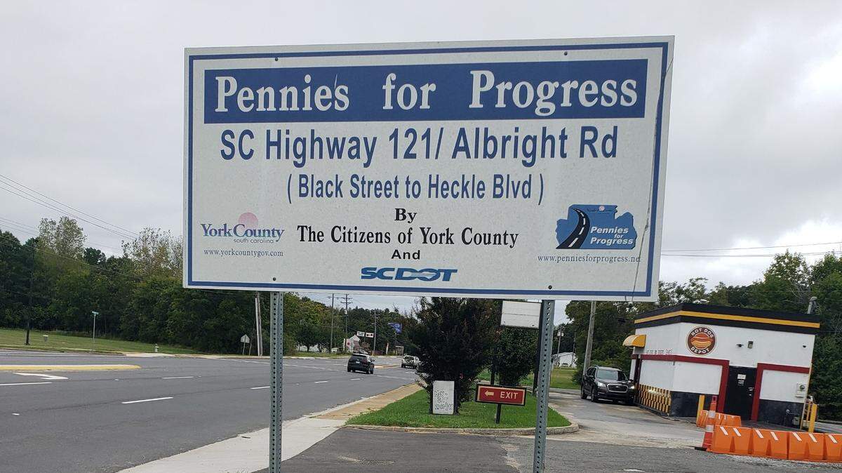 Pennies for Progress signs like this are common in York County, S.C. Voters will decide this fall if the tax used to pay road projects will continue.
