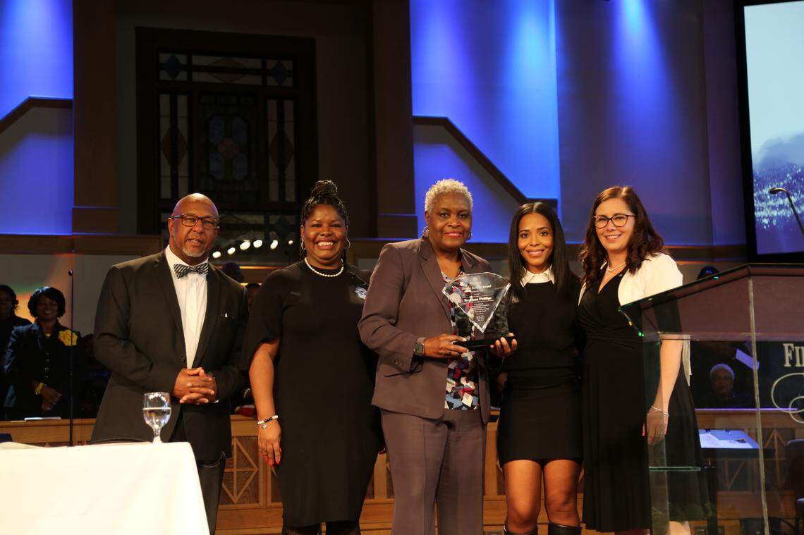 Regeana Phillips, center, is one of two Dream Keep Award recipients in Rock Hill for service roles from finding jobs for people released from prison to providing shelter for women in need.