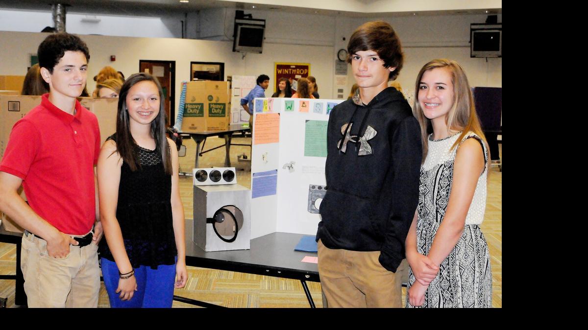 
Ryan Kelley, left, Olivia Caulder, Hunter Parks and Dru Brakefield made a washer and dryer combo for people who don’t like to do laundry.
