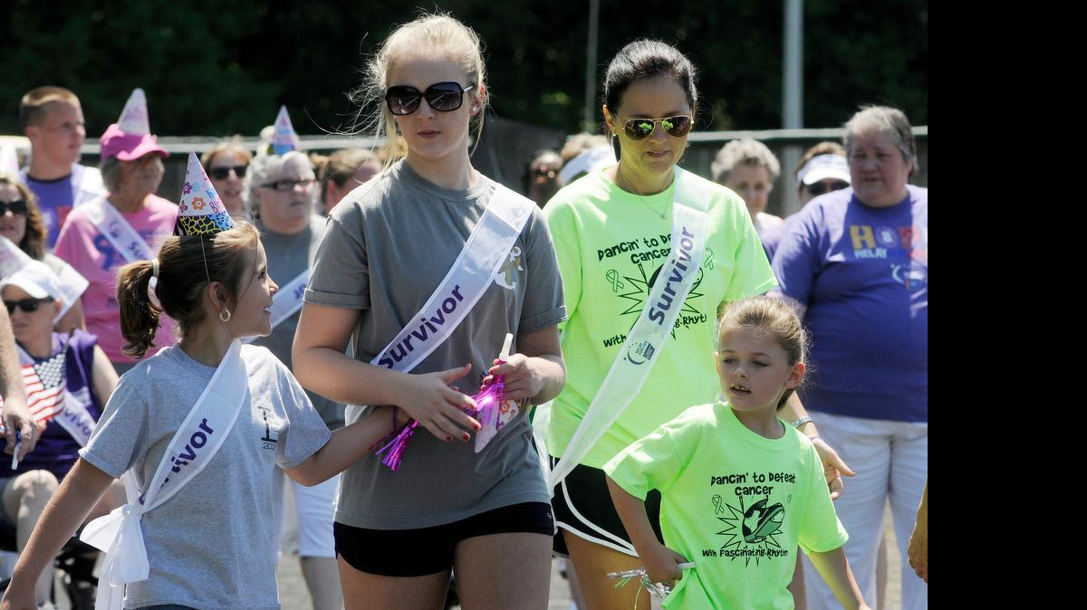 
Cancer survivors of all ages participate in the survivor lap at Western York County Relay for Life.

