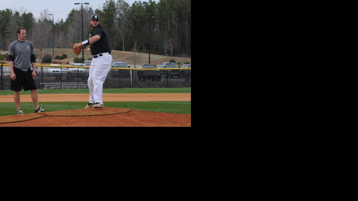 
Will Prince works on pickoff moves Monday during York baseball practice, while first-year head coach Eddie Tisdale advises. During his time as a player at Winthrop, Tisdale coached Prince’s fall team in 2006. Prince wears No. 22 to this day because that’s the number that Tisdale wore.
