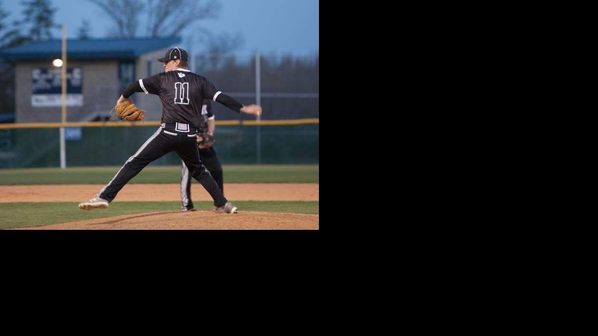 
Ryan Gilbert pitches for York against Clover High.

