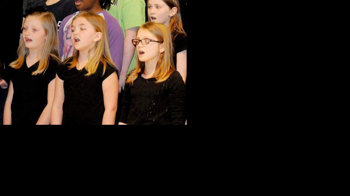 
Larne Elementary School students Camille Isenhour, from left, Alexa Loncaric and Madalin Maldonado sing during a Black History Month performance at the school last week.

