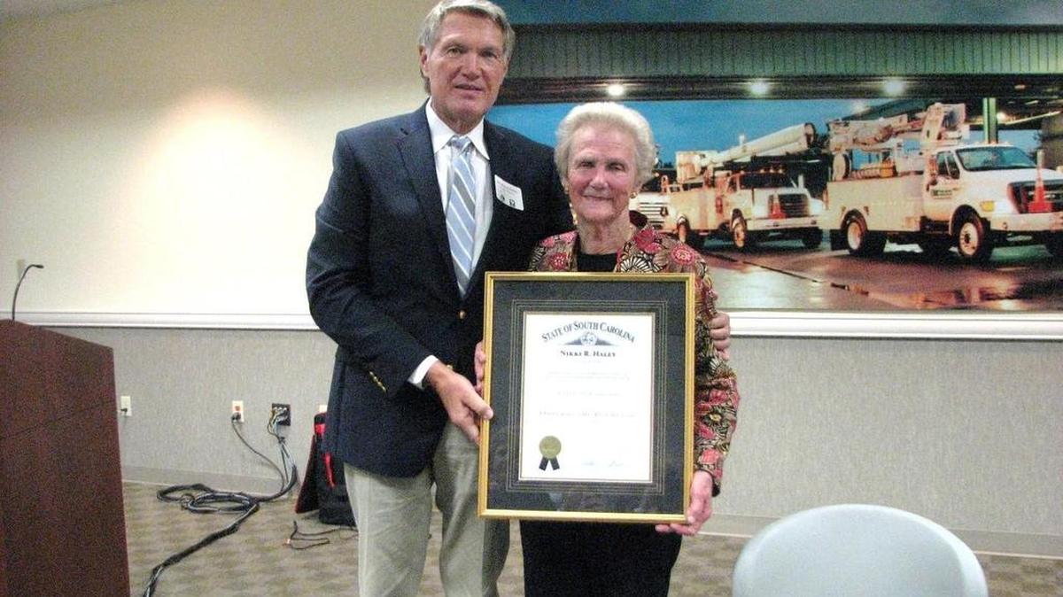 State Sen. Harvey Peeler presents the Order of the Palmetto to Evelyn G. Edmunds of Clover.