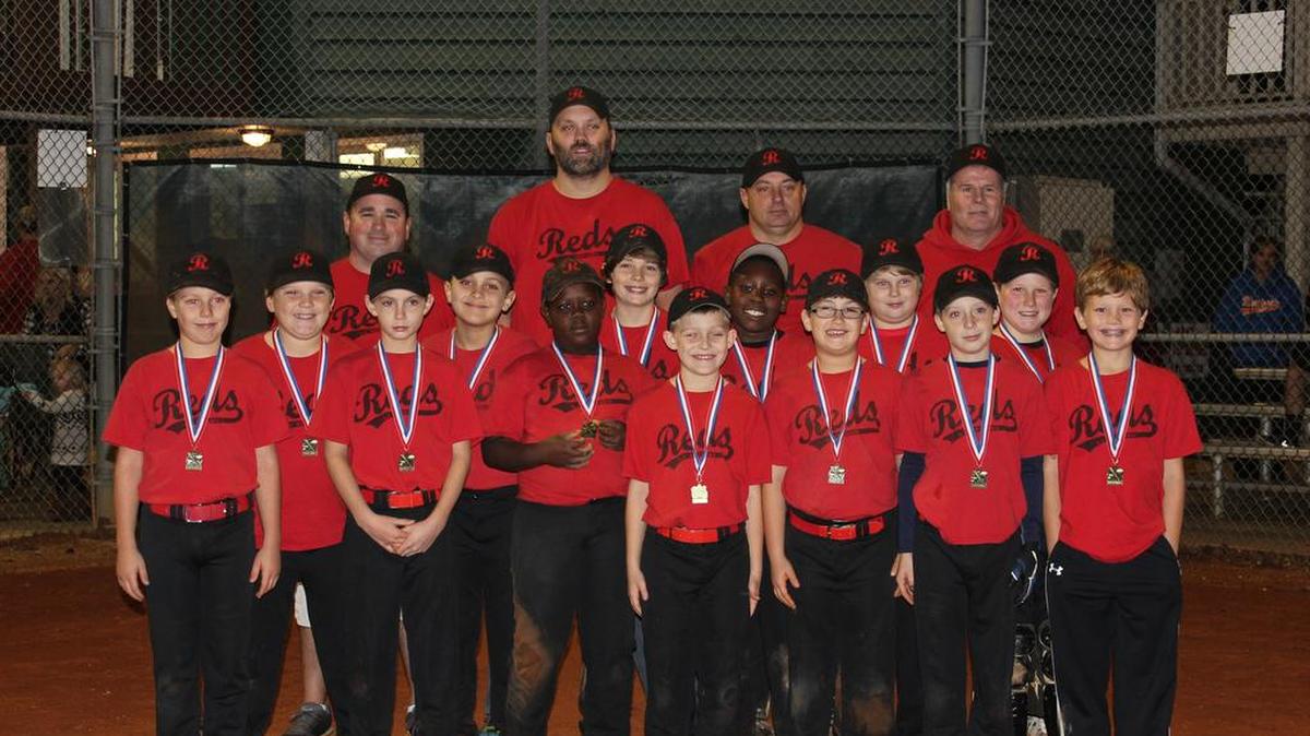 The York Reds won the Clover fall minor league championship. Pictured are, back left, Jeremy Courtney, head coach Travis Taylor, Brian Lowder and Jim Rumaker; middle left, Cooper Queen, Jessie Lowder, Isaac Hunsucker, Logan Burris, Jayson Rumaker and Stevie Welch; and front left, Coleman Harvey, Hunter Smoak, Darion June, Jake Sims, Kaden McManis, Caleb Dover and Jaxon Taylor.