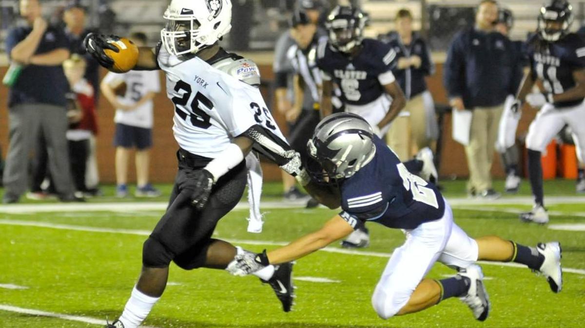 York’s Tyquan McCray evades Clover’s Tenchi Her Friday night at Clover.