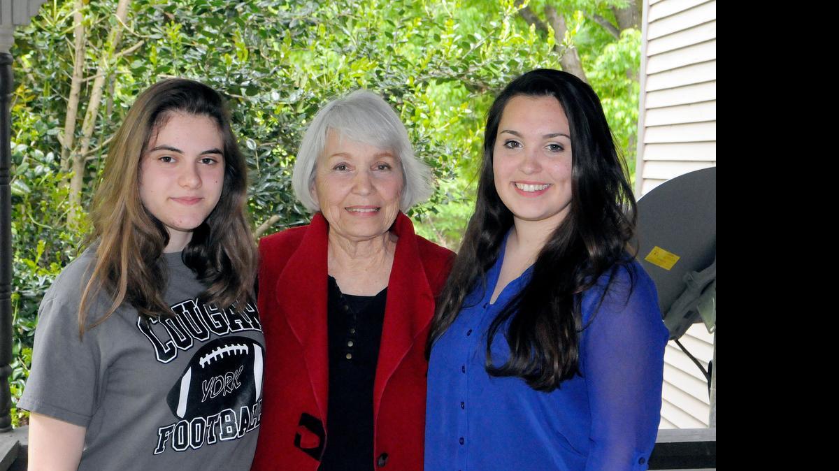 
Milica Knezevic, left, and Lara Nunes, right, are exchange students who have spend the past school year with host Genevieve Polites. 
