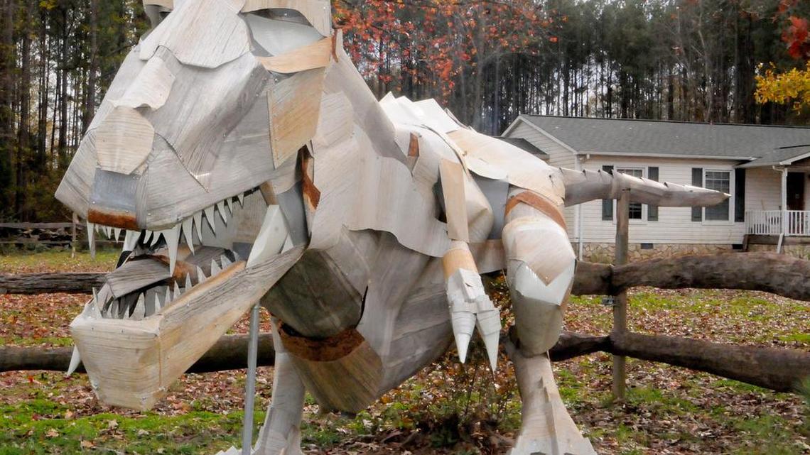 York man finishes metal dinosaur sculpture in his front yard