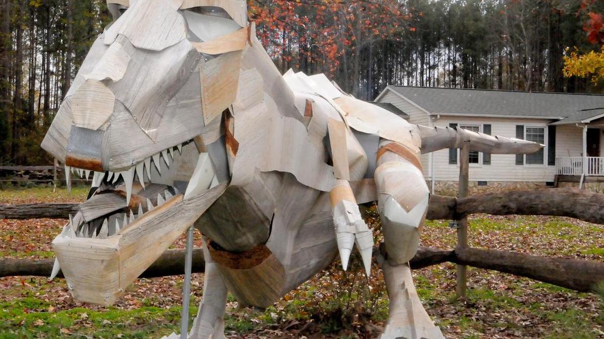 Pete Kohman built this T-Rex sculpture from galvanized steel in the front yard of his home near York.