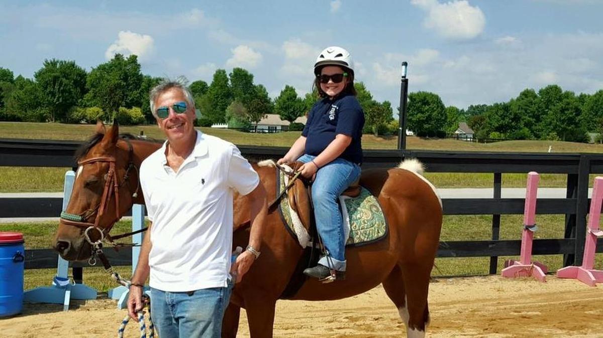 
Special Olympic athlete, Haylee Nicolson with coach Michael Schonfeld, is one of nine equestrian athletes who will compete in a Special Olympics in Raleigh this weekend.
