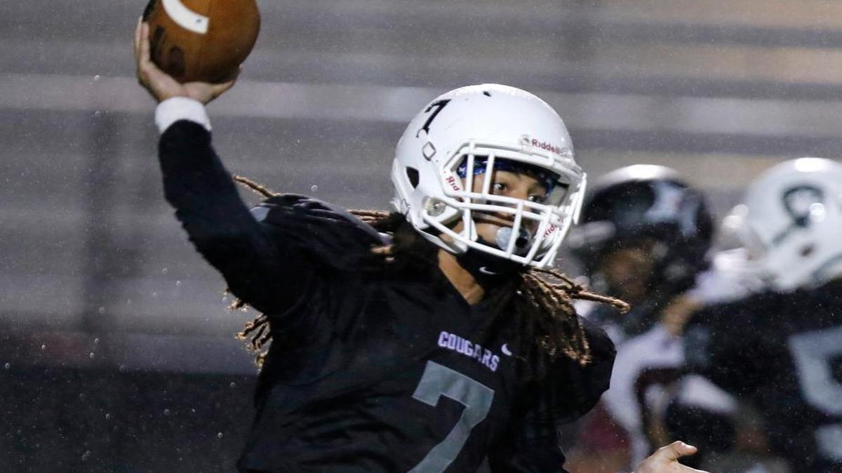 
York quarterback Wally Wilmore fires a pass against Rock Hill in Friday’s game against the Rock Hill Bearcats. 
